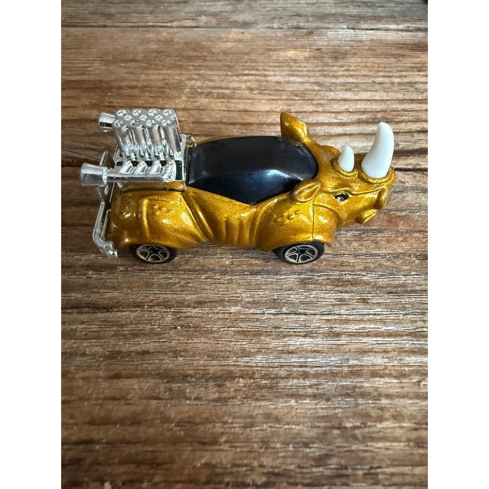 VTG 90s Matchbox Rhino Rod Diecast Car Gold Animal Toy Chrome Engine 1994